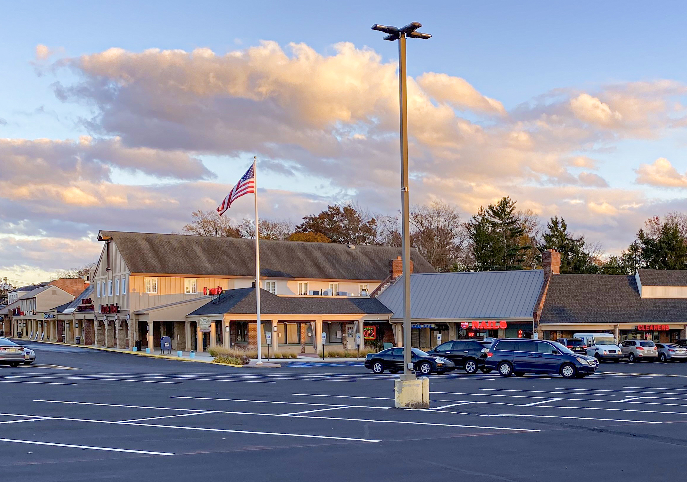 Buildings and parking lot in the Barclay Farms shopping center